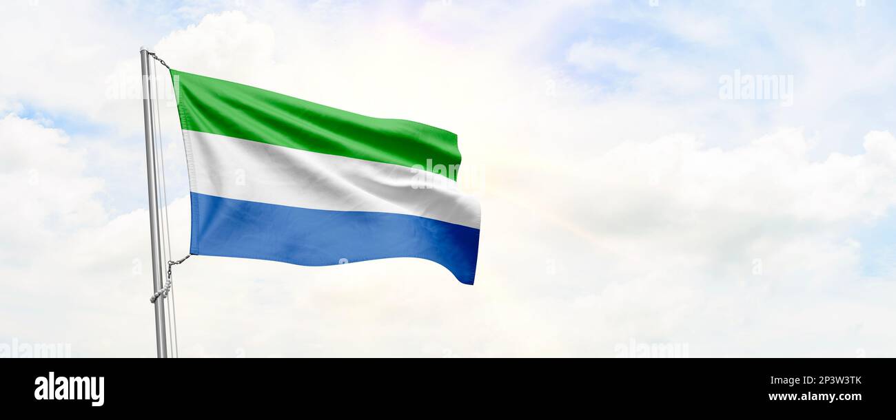 Sierra Leone flag waving on sky background. 3D Rendering Stock Photo ...