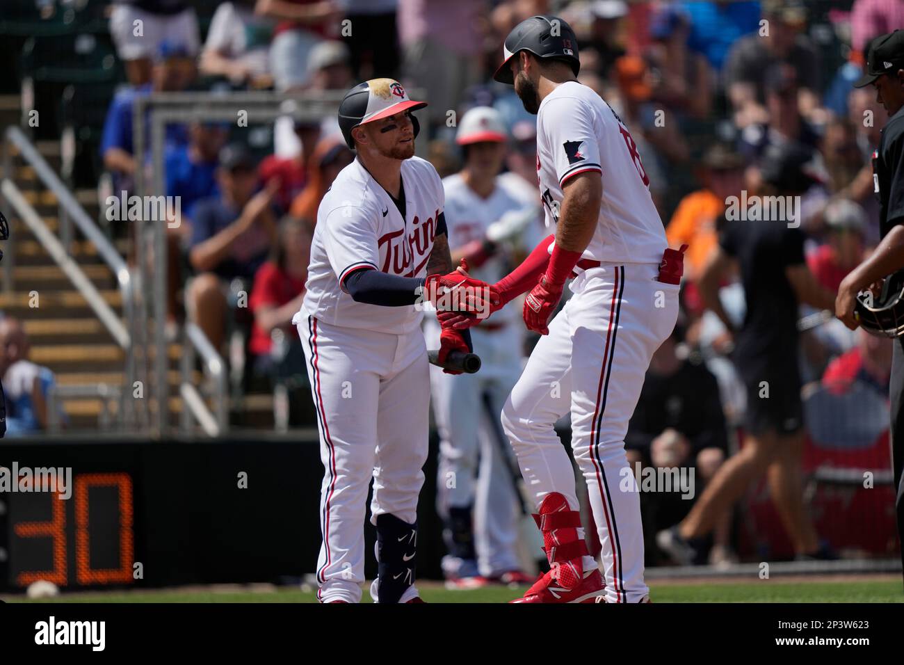 Minnesota Twins Joey Gallo (13) is greeted at the plate by Christian