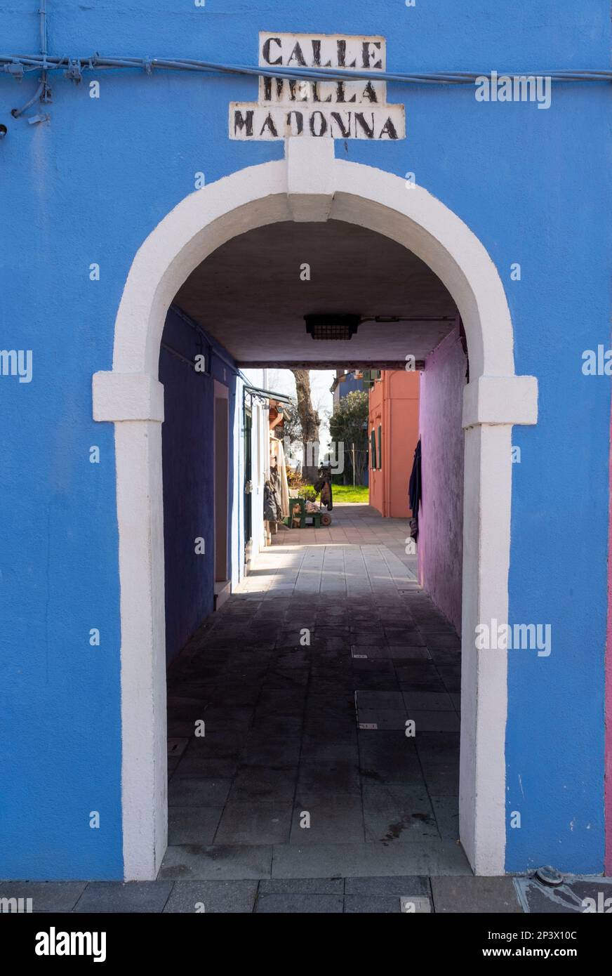 Coloured archway at Calle Del Madonna, Burano, Venice lagoon, Italy Stock Photo