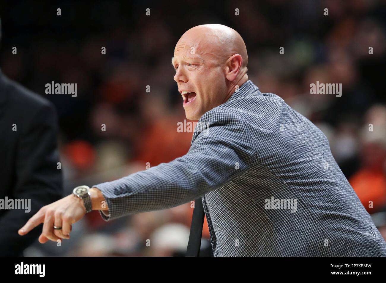 california-assistant-coach-chris-harriman-reacts-during-an-ncaa-college