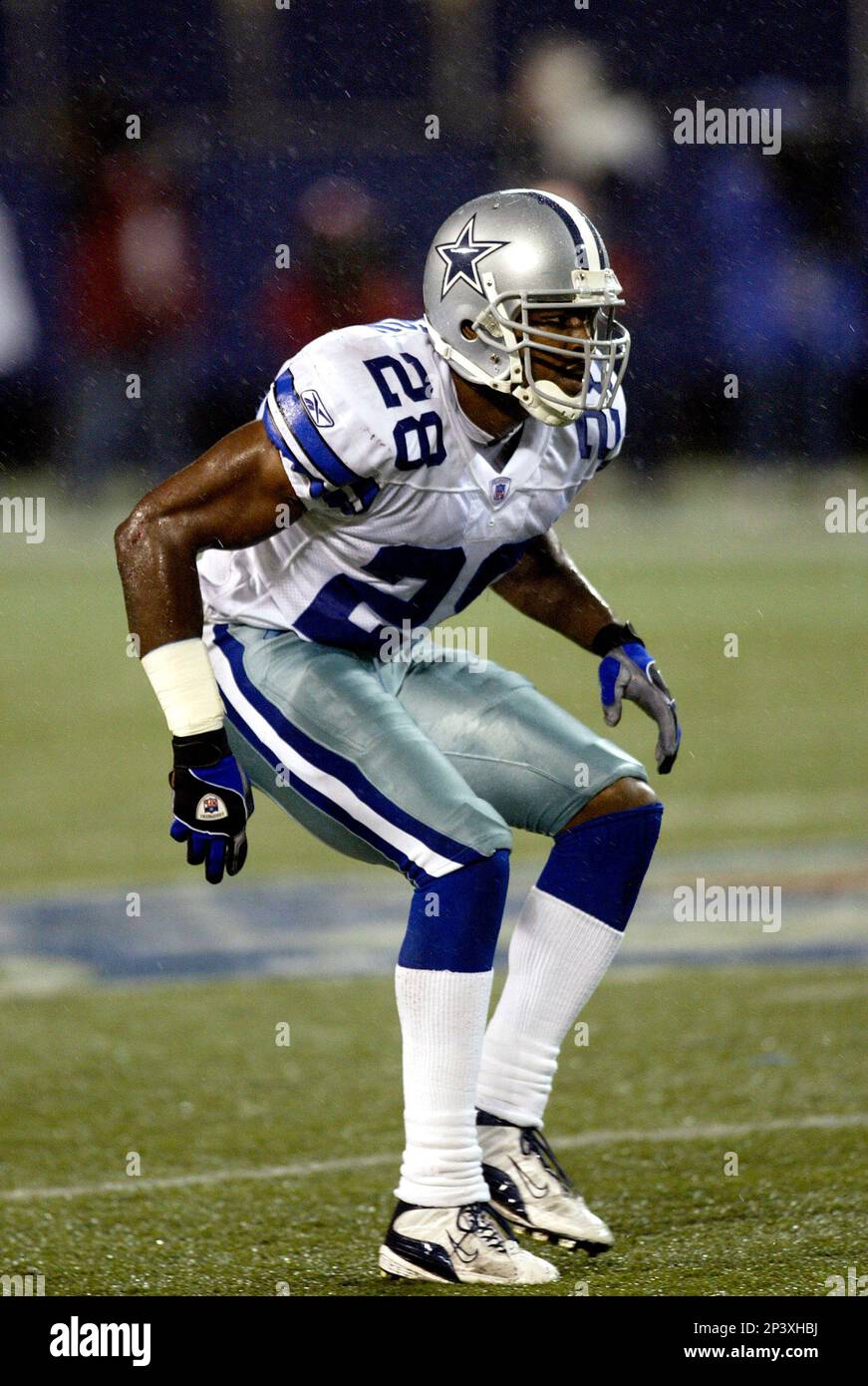 15 Sept 2003: DB Darren Woodson of the Dallas Cowboys in the rain in the Dallas  Cowboys 35-32 overtime win over the New York Giants at Giants Stadium in  East Rutherford, NJ. (