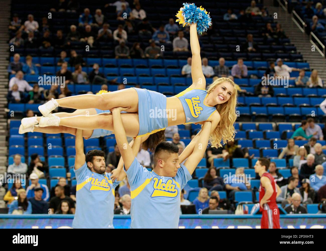 20 November 2014: UCLA cheerleaders perform a stunt at a time out ...