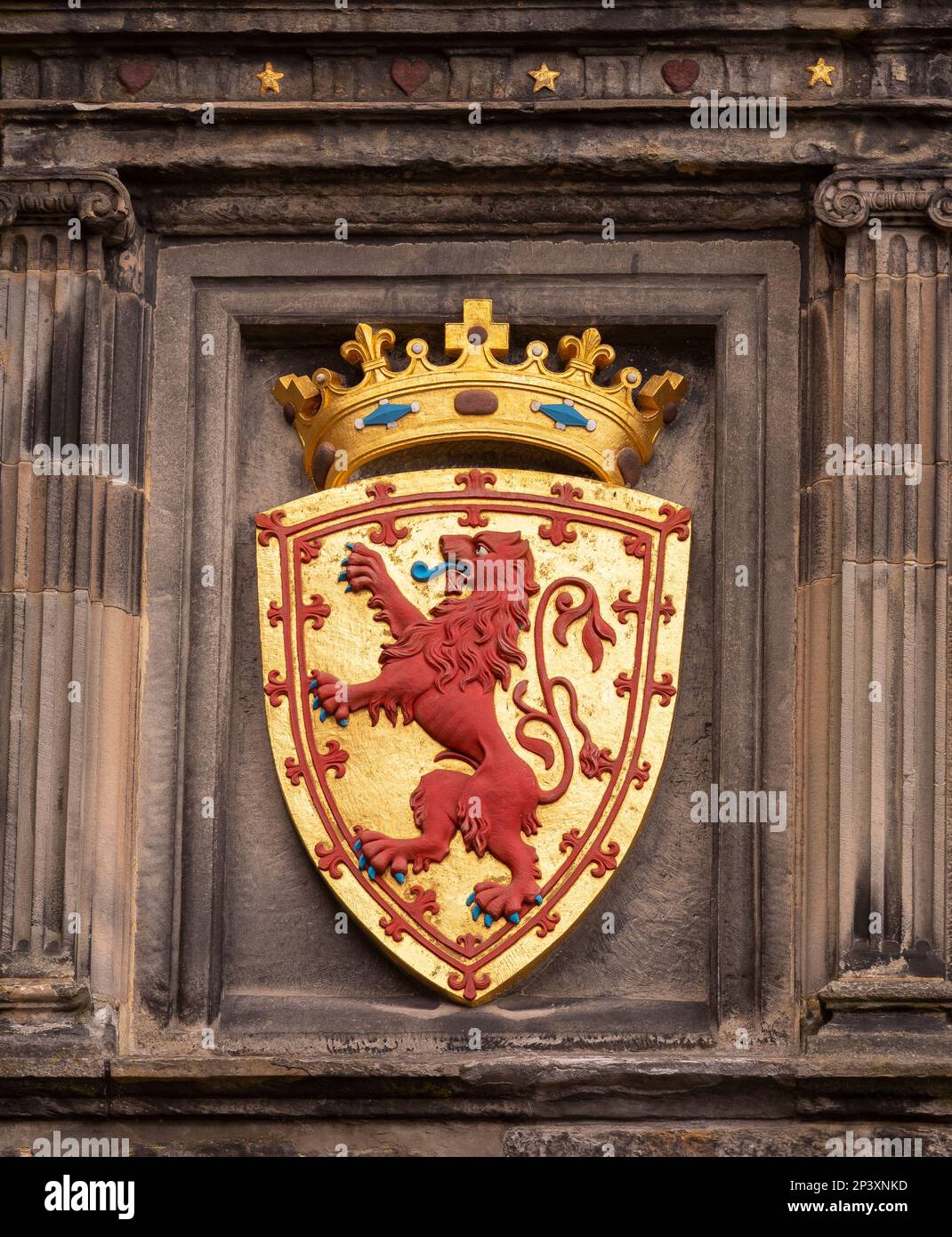 EDINBURGH, SCOTLAND, EUROPE - Royal Coat of Arms at Portcullis Gate in Edinburgh Castle. Includes The Lion Rampant and the royal crown of Scotland. Stock Photo