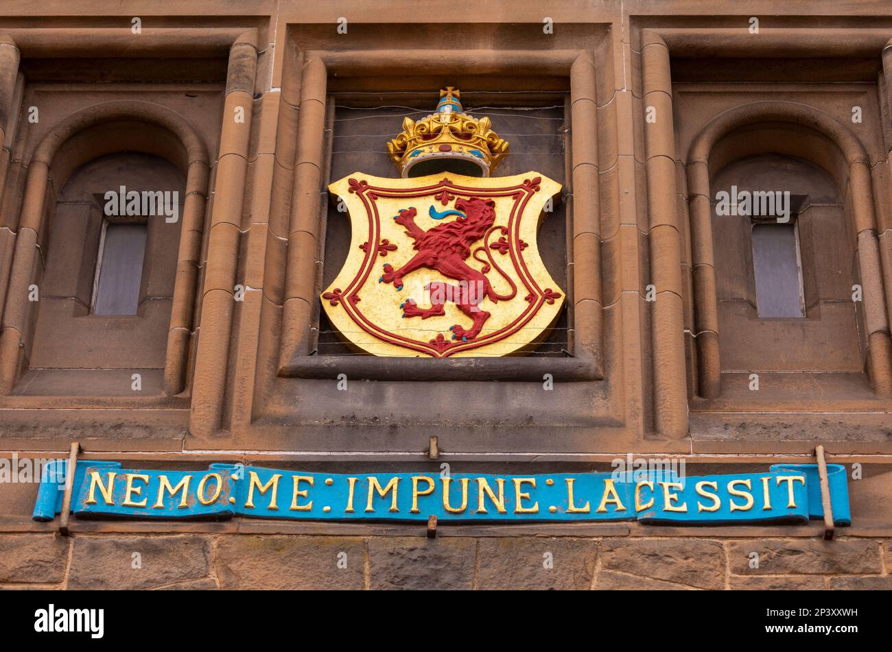 EDINBURGH, SCOTLAND, EUROPE - Royal Coat of Arms at entrance to Edinburgh Castle. Includes The Lion Rampant and the royal crown of Scotland. Stock Photo