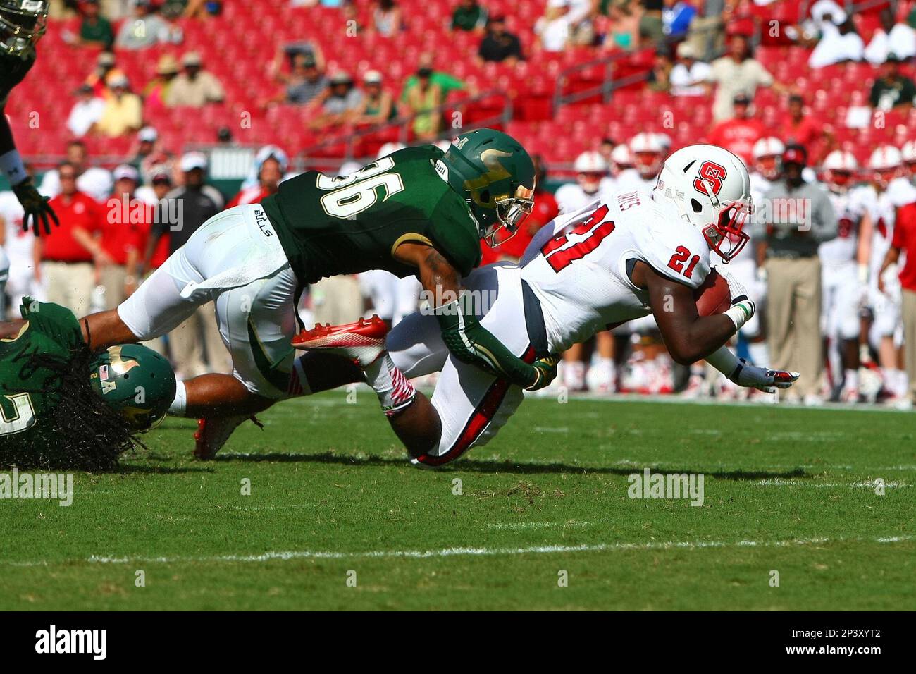 Sep 13 2014 South Florida's Nate Godwin (36) tackles Matt Dayes (21
