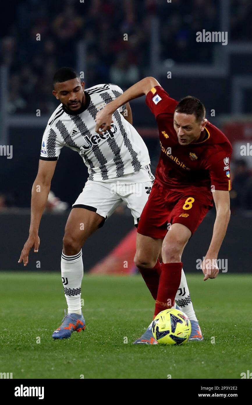 Rome, Italy. 05th Mar, 2023. Nemanja Matic, right, of AS Roma, is challenged by Danilo, of Juventus, during the Serie A football match between Roma and Juventus at Rome's Olympic stadium, Rome, Italy, March 05, 2023. Credit: Riccardo De Luca - Update Images/Alamy Live News Stock Photo
