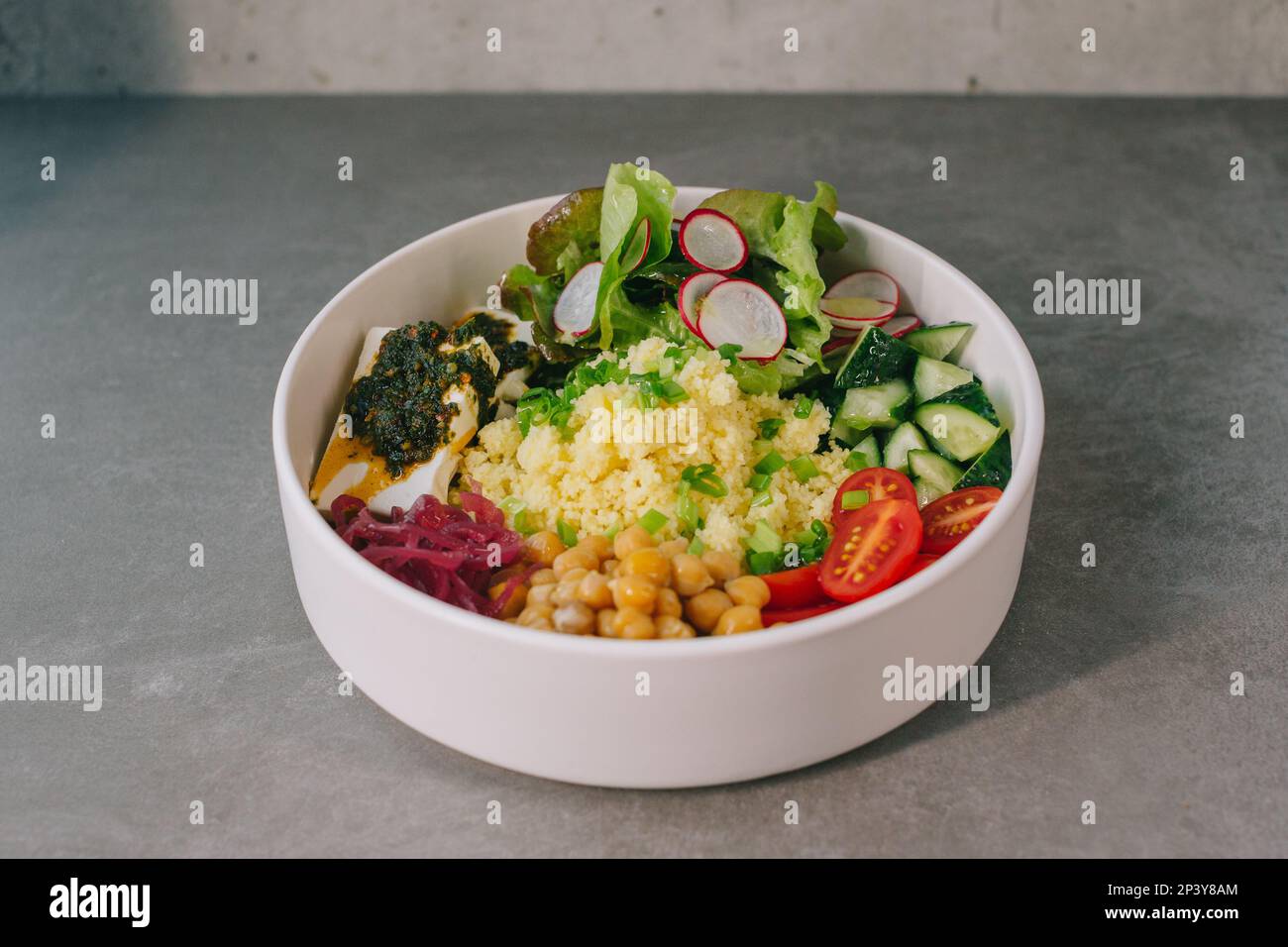 Poke bowl with vegetables and cheese. Stock Photo