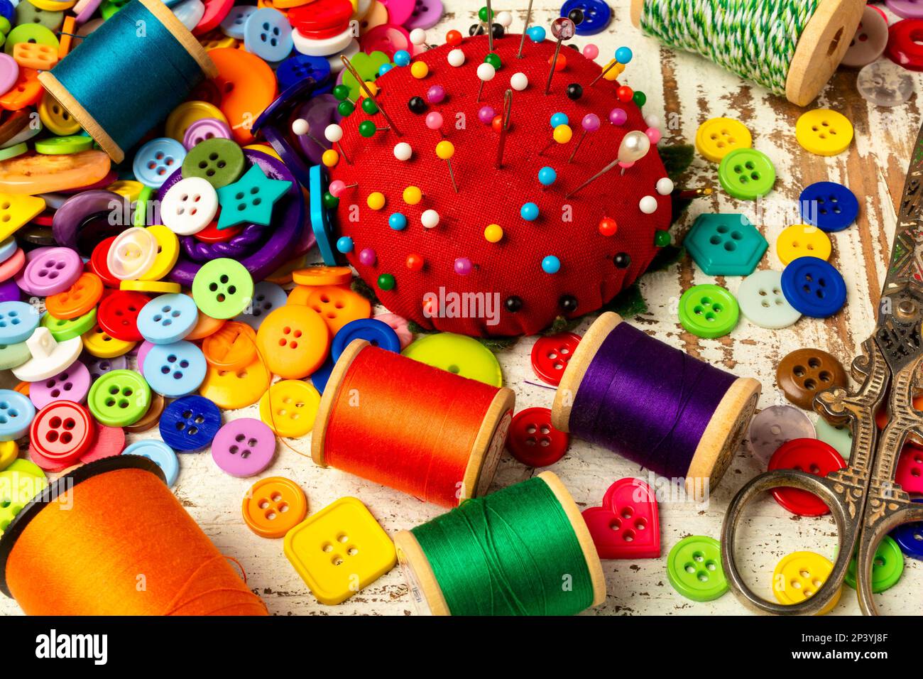 Red Pincushin And Thread With Buttons And Scissors Still life Stock ...