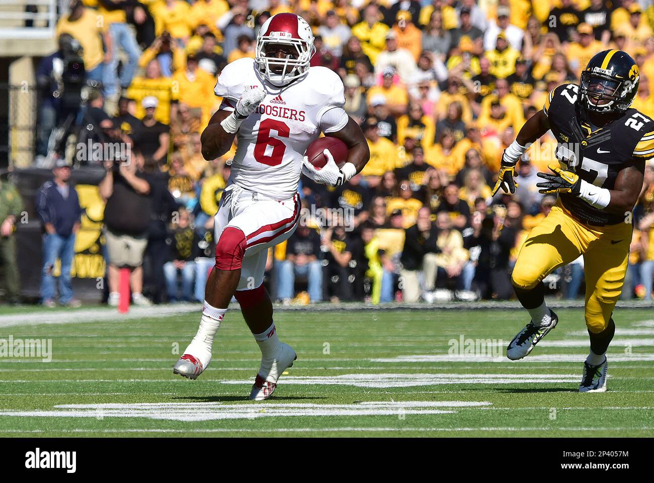 october 11 2014 iowa hawkeyes free safety jordan lomax 27 watches as indiana runningback tevin coleman 6 breaks free on a 45 yard touchdown run in the second period during a big ten conference game football game between the iowa hawkeyes and the indian hoosiers at kinnick stadium in iowa city iowa iowa won 45 29 icon sportswire via ap images 2P4057M