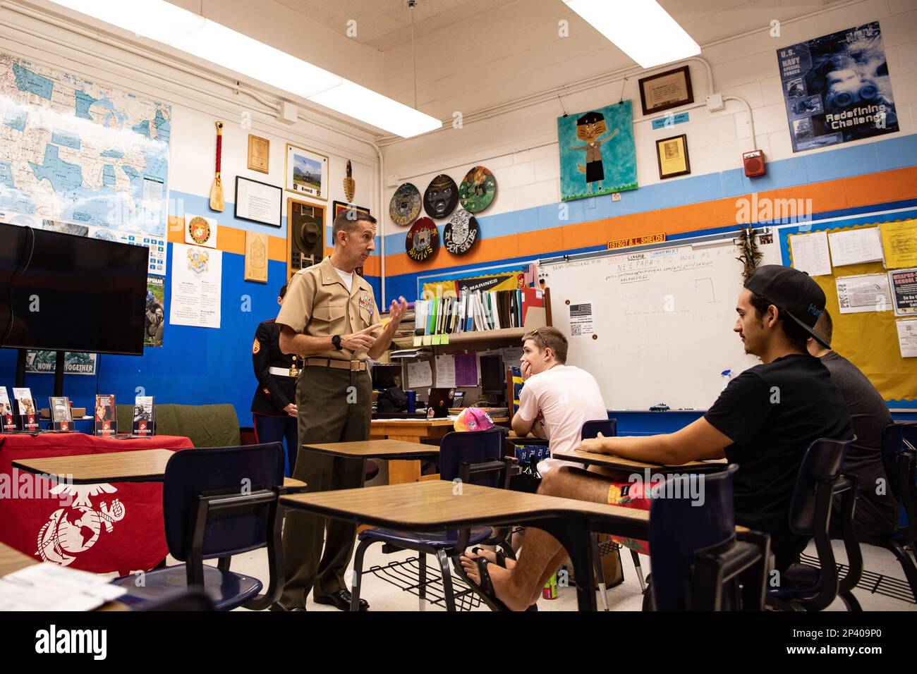 U.S. Marine Corps LtCol. Caleb Eames from Marine Corps Base Hawaii, addresses students at