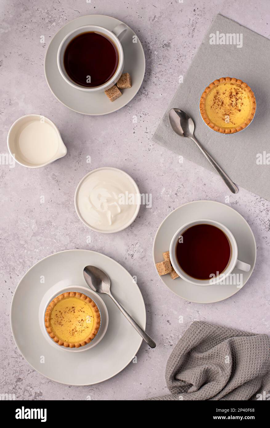 Food photography of tea, milk, coffee, yogurt, custard tart, sugar