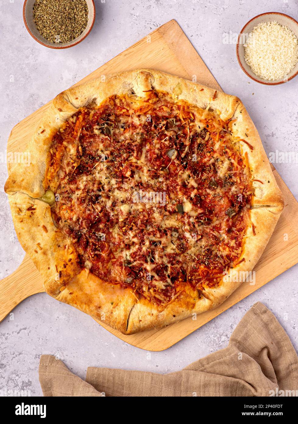 Food photography of mexican pizza, meat, beef, cheese; jalapeno, tomato