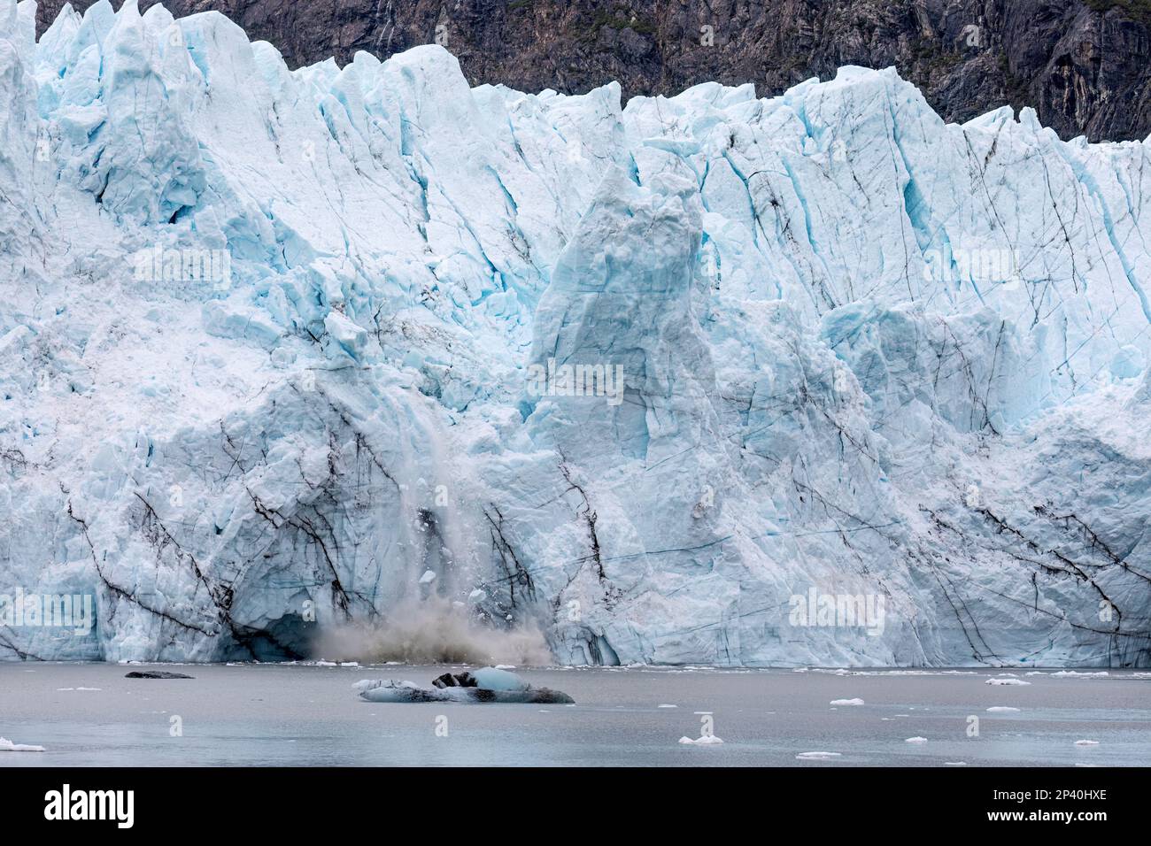 A view of Margerie Glacier calving in the Fair-weather Range, Glacier Bay National Park, Southeast Alaska, USA. Stock Photo