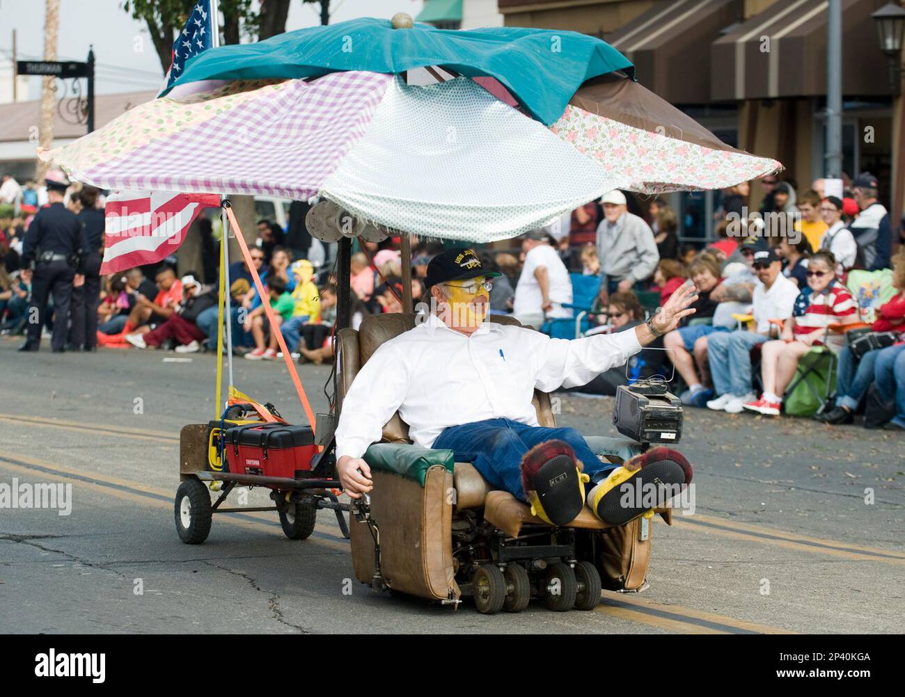 A member of Shriners rides on a customized recliner at the 96th annual