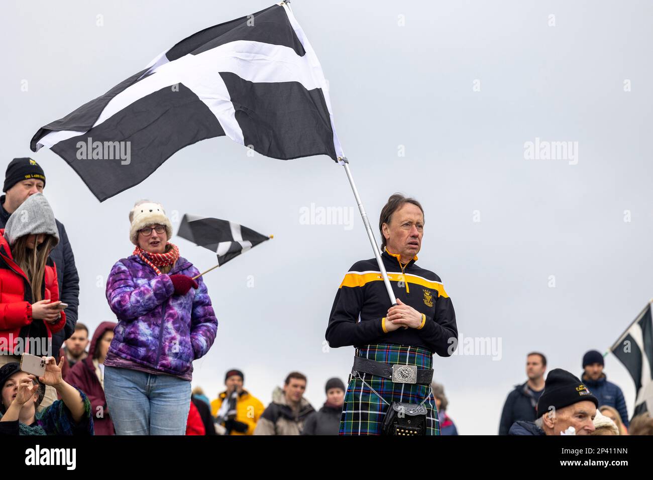 The St Pirans Day Procession to the Oratory at Perranporth 2023, said to be one of the first sites of Christianity when Piran arrived in Cornwall. Stock Photo