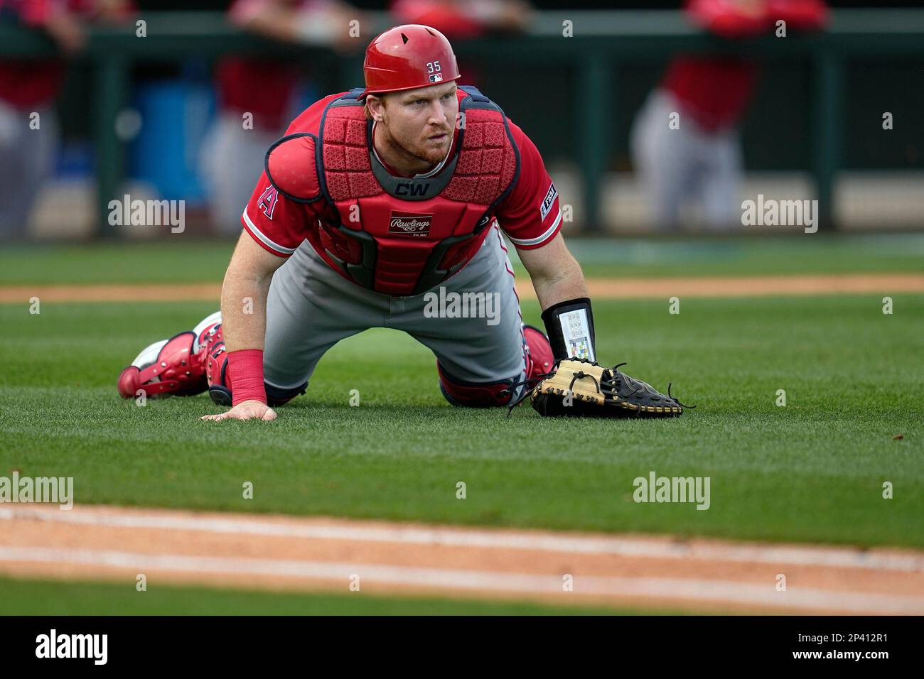 Los Angeles Angels catcher Chad Wallach reacts after committing a