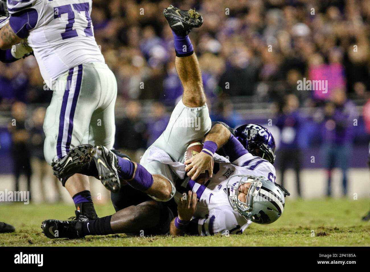 08 NOV 2014 Kansas State Wildcats quarterback Jake Waters (15) is sacked by TCU Horned Frogs