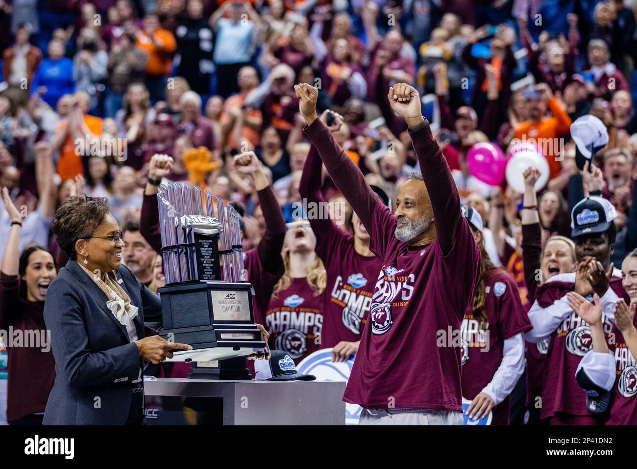 Greensboro, NC, USA. 5th Mar, 2023. Virginia Tech Hokies head coach Kenny Brooks celebrates as he receives the Championship trophy for winning the finals of the Women's ACC Tournament at Greensboro Coliseum in Greensboro, NC. (Scott Kinser/Cal Sport Media). Credit: csm/Alamy Live News Stock Photo