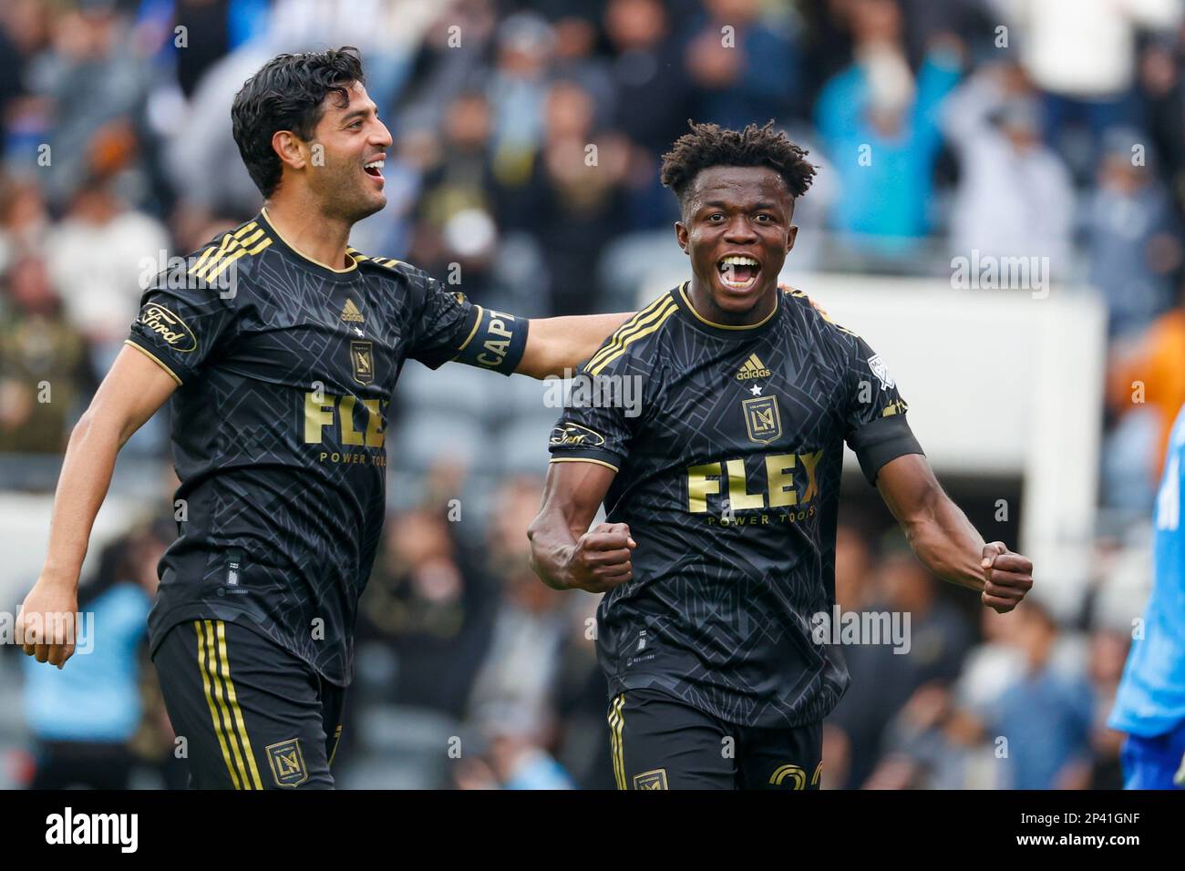 Los Angeles, United States. 04th Mar, 2023. Los Angeles FC forwards Kwadwo Opoku (R) celebrates a goal with Carlos Vela (L) during an MLS soccer match against the Portland Timbers in Los Angeles. Credit: SOPA Images Limited/Alamy Live News Stock Photo