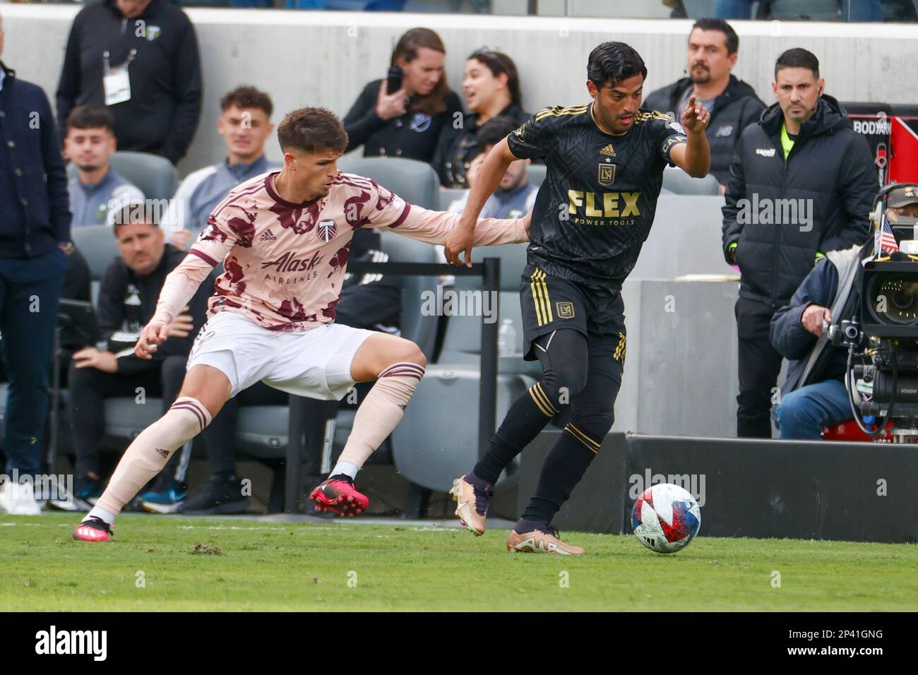 Los Angeles, United States. 04th Mar, 2023. Los Angeles FC forward Carlos Vela (R) and Portland Timbers defender Justin Rasmussen (L) seen in action during an MLS soccer match in Los Angeles. Credit: SOPA Images Limited/Alamy Live News Stock Photo