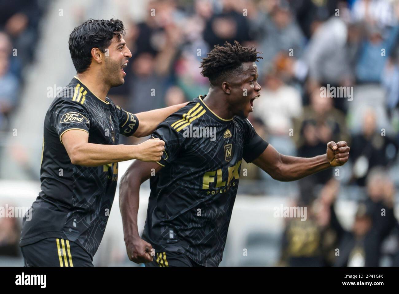 Los Angeles, United States. 04th Mar, 2023. Los Angeles FC forwards Kwadwo Opoku (R) celebrates a goal with Carlos Vela (L) during an MLS soccer match against the Portland Timbers at BMO Stadium in Los Angeles. Credit: SOPA Images Limited/Alamy Live News Stock Photo