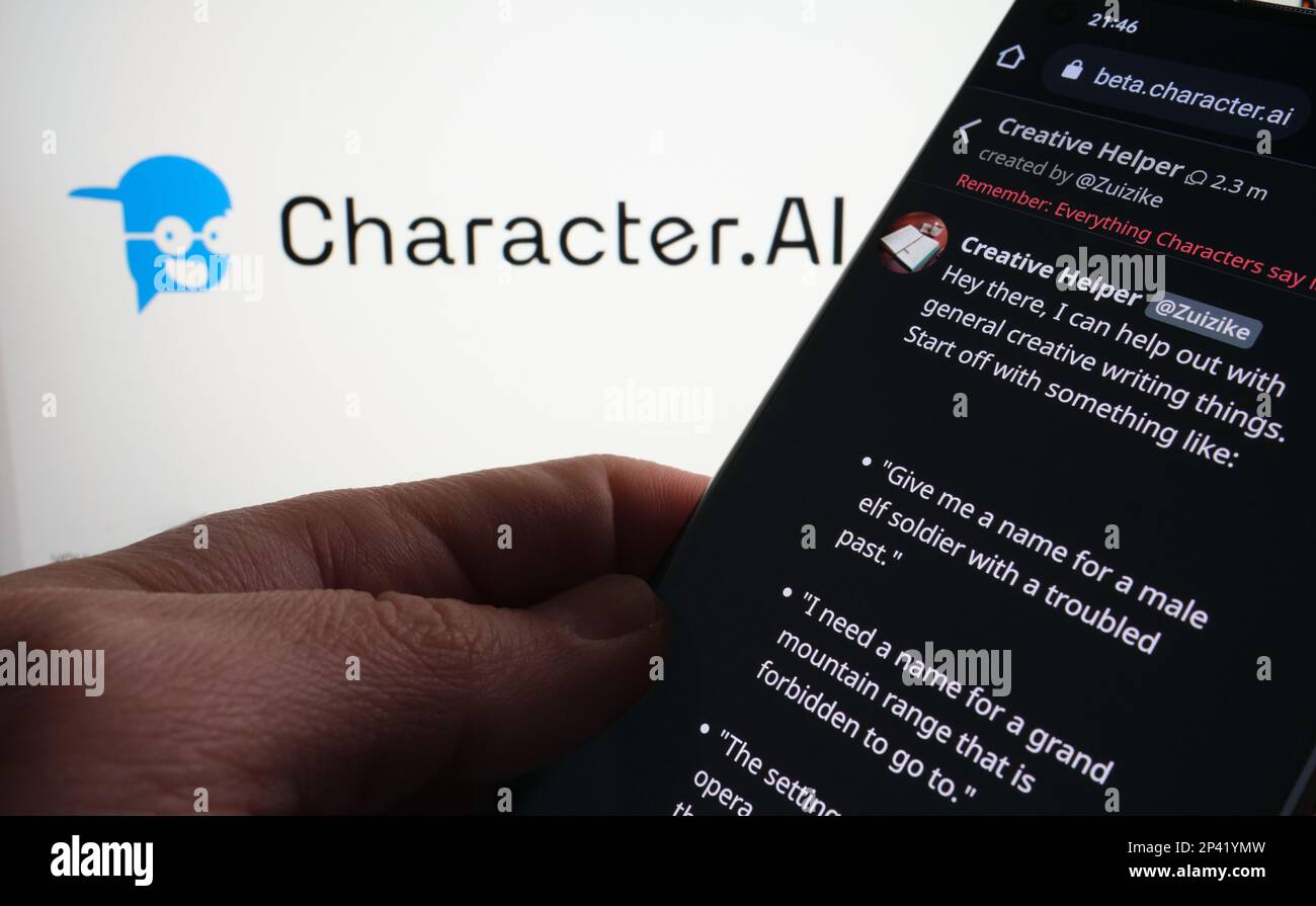 Character AI Chatbot example seen on smartphone screen. Blurred Character.AI logo on the background. Stafford, UK, March 5, 2023 Stock Photo