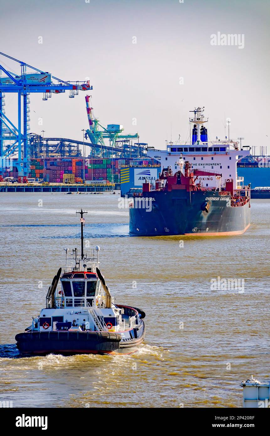 Hermes, a Rotortug tugboat owned by Seabulk Towing, approaches oil tanker Overseas Cascade near the Port of Mobile, March 4, 2023, in Mobile, Alabama. Stock Photo