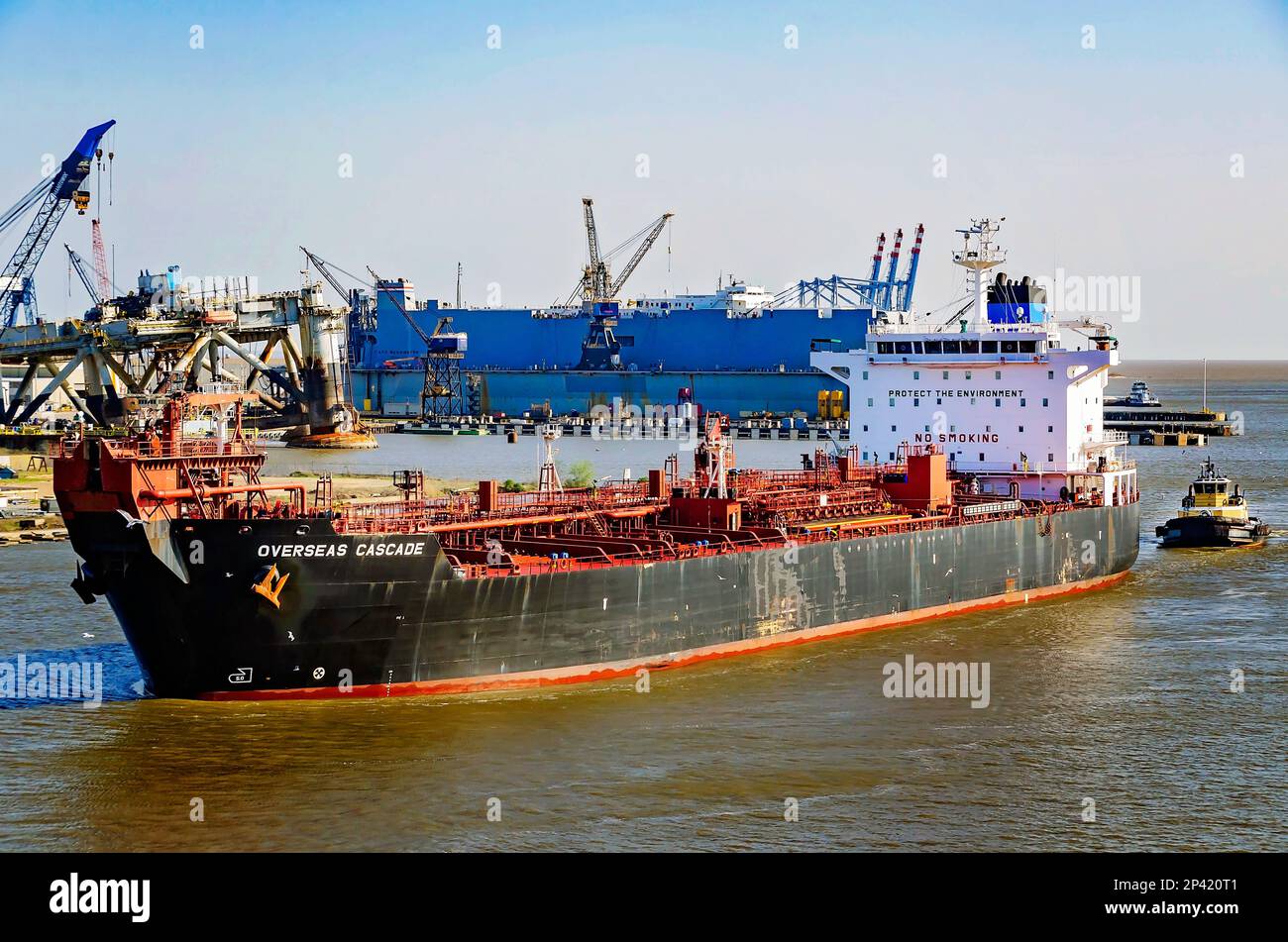 Overseas Cascade is pictured as it enters the Port of Mobile assisted by the tugboat Lisa Cooper, March 3, 2023, in Mobile, Alabama. Stock Photo