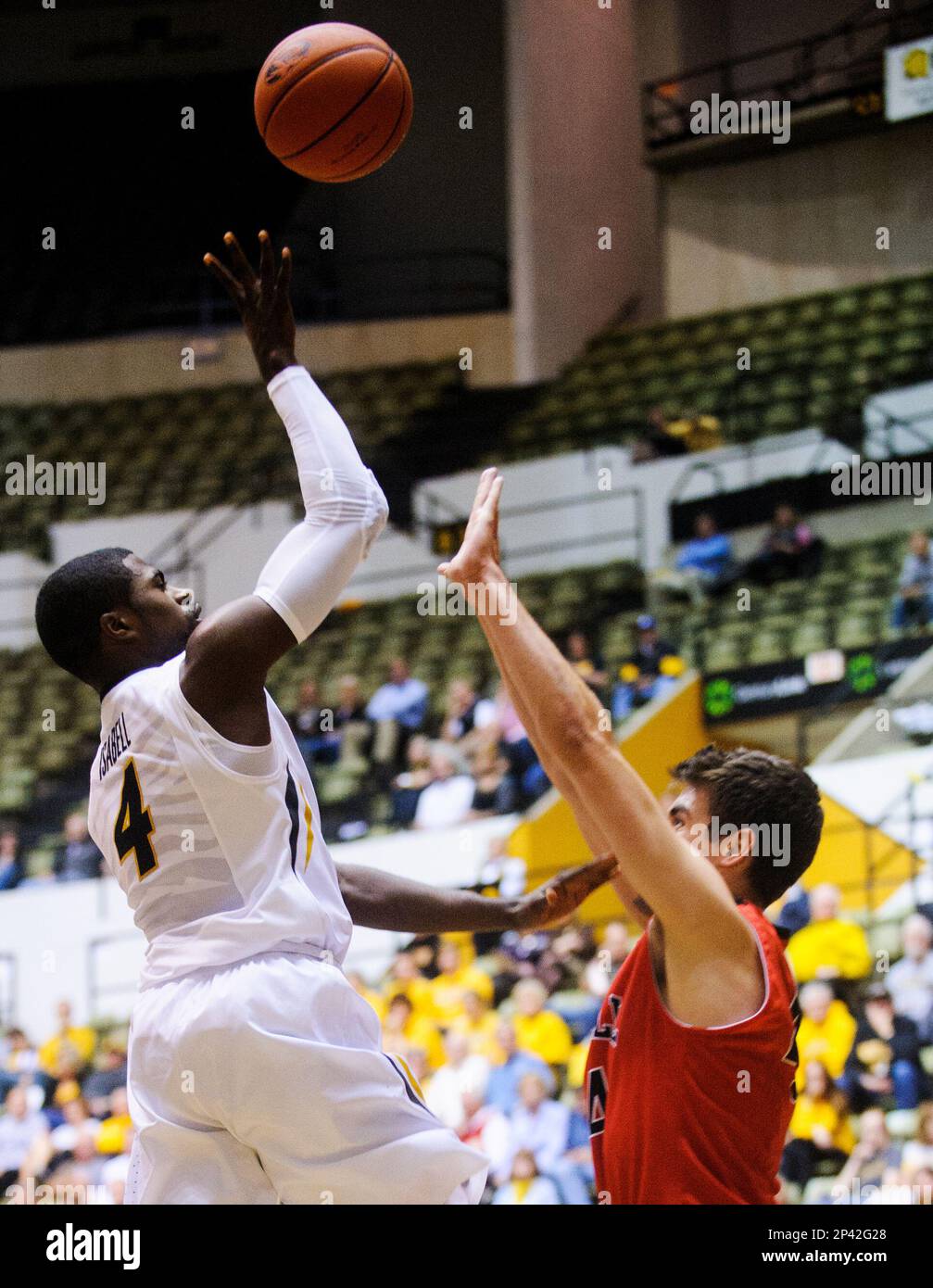 Missouri's Tramaine Isabell, left, shoots over William Jewell's Clint  McCullough in an NCAA college basketball game in Columbia, Mo., on  Wednesday, Oct. 29, 2014. (AP Photo/Columbia Daily Tribune, Nick Schnelle  Stock Photo 