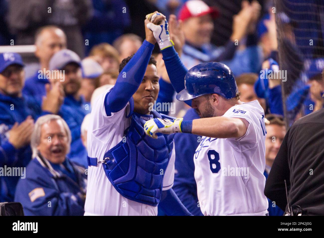 April 11, 2015: Kansas City Royals Third base Mike Moustakas (8) [7040] and  Kansas City Royals Catcher Salvador Perez (13) [7963] celebrate after a  home run by Moustakas during the Kansas City