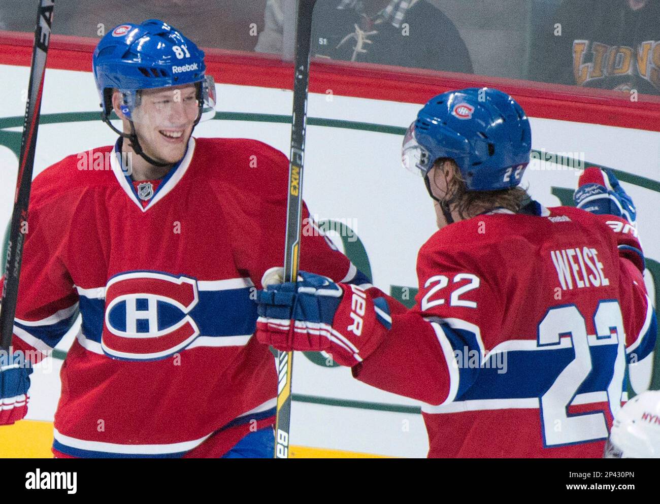 Montreal Canadiens' Lars Eller, left, celebrates with teammate Dale