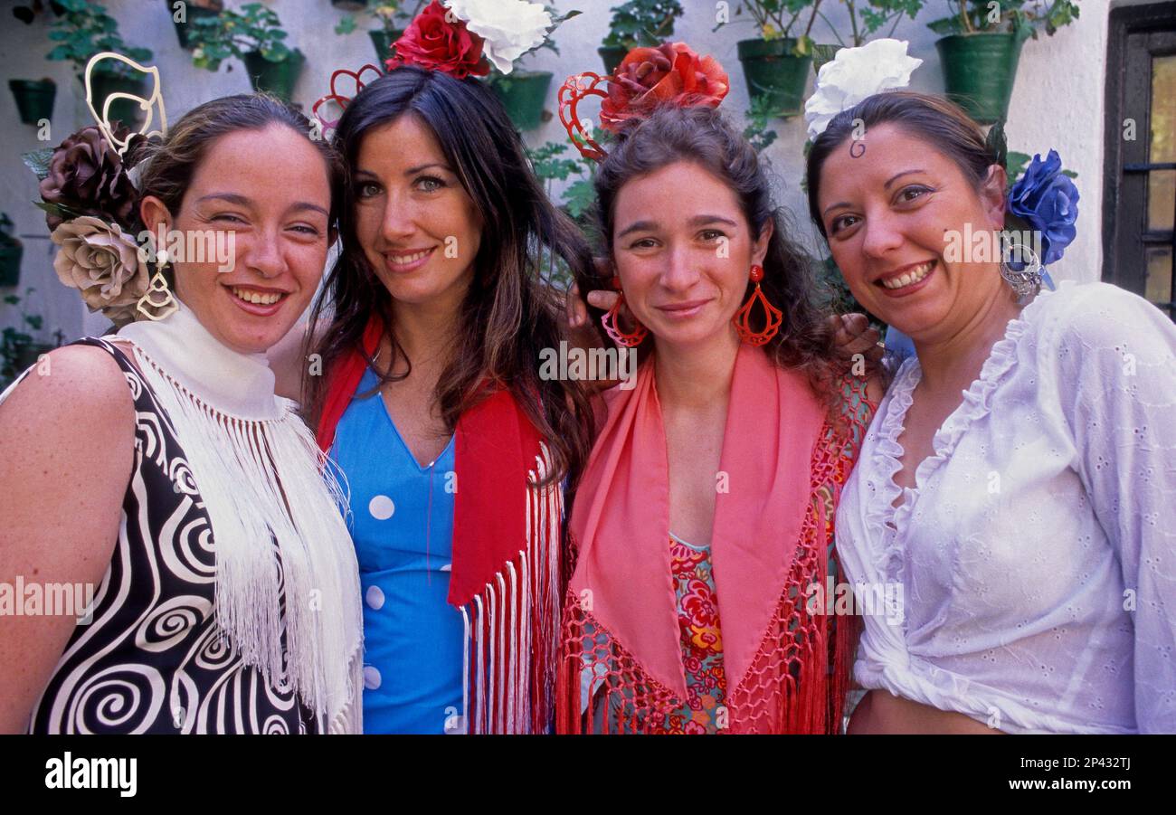 Córdoba.Andalusia. Spain: Portrait of women wearing traditional suit during the May Fair Stock Photo
