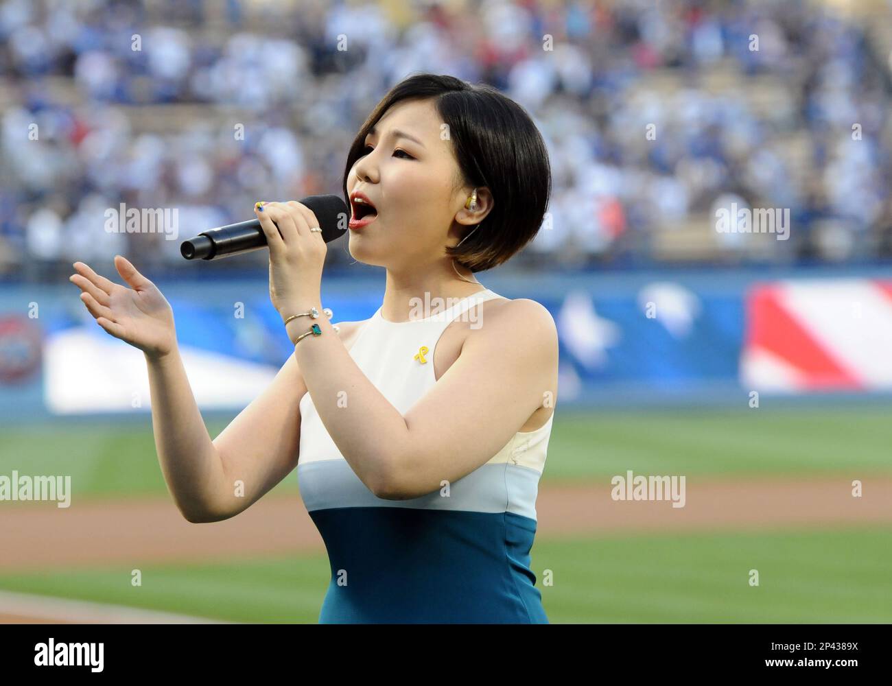 27 May 2014: Korean singer Ali sings the Star Spangled Banner during a ...