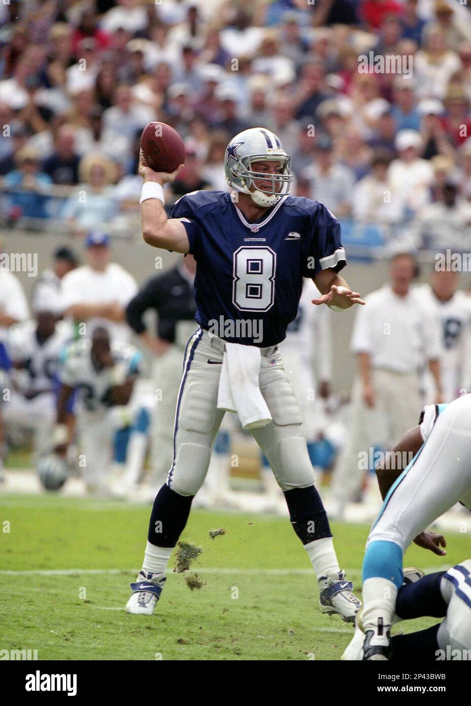 Quarterback Troy Aikman #8 of the Dallas Cowboys drops back to