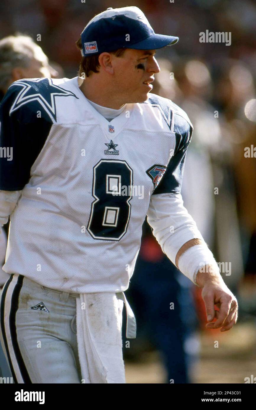 Quarterback Troy Aikman #8 of the Dallas Cowboys looks on from the