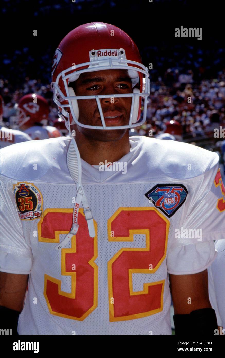 Running back Marcus Allen 32 of the Kansas City Chiefs looks on from