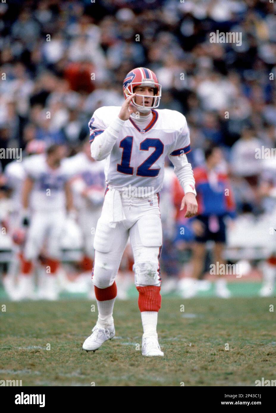 Quarterback Jim Kelly #12 of the Buffalo Bills gets the play from the  sidelines.Circa the 1980's. (Icon Sportswire via AP Images Stock Photo -  Alamy