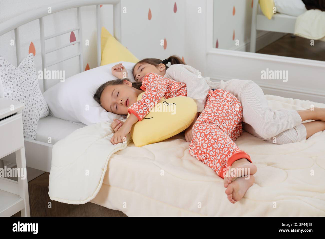 Cute girls in pajamas sleeping at home Stock Photo Alamy