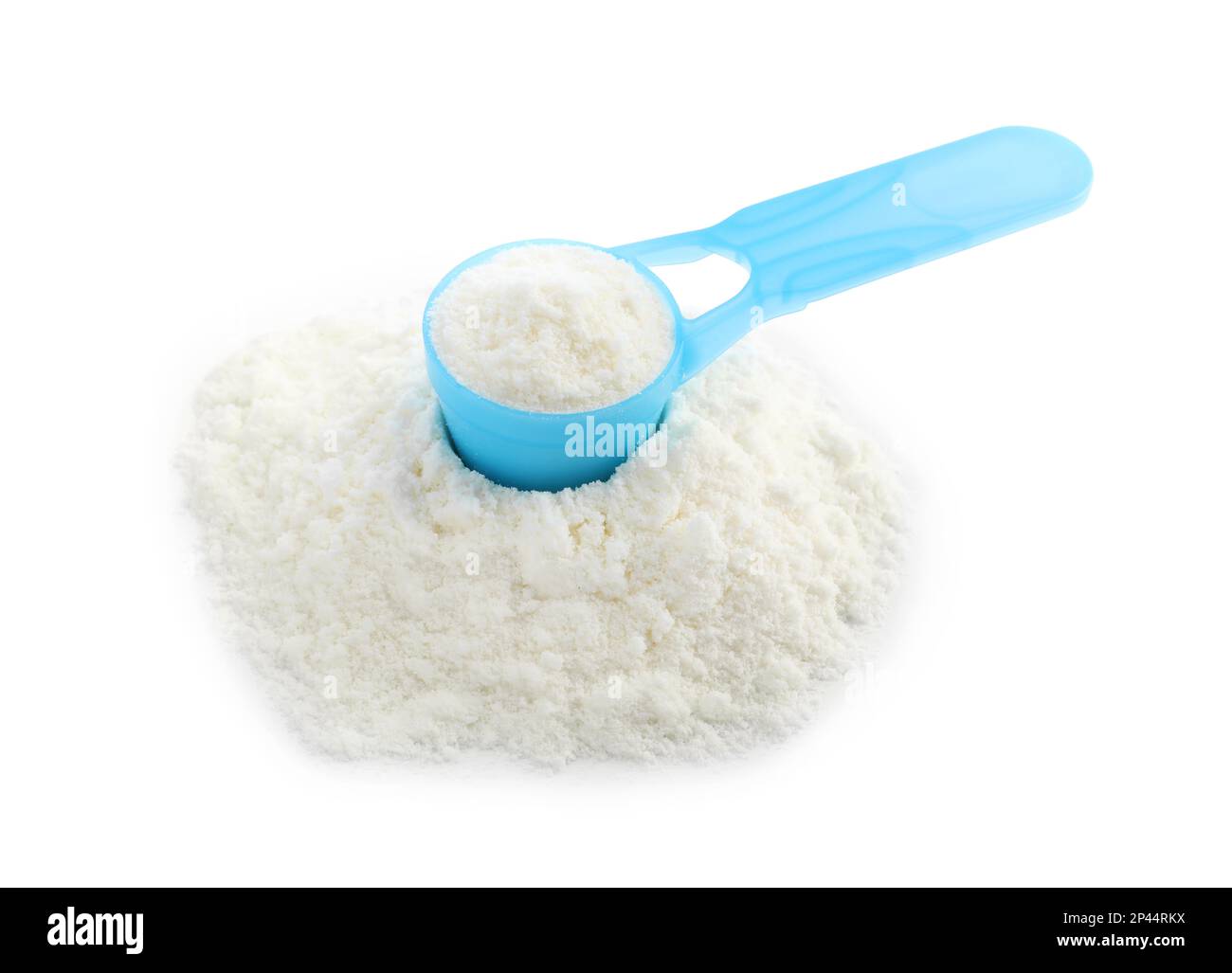 Powdered infant formula and scoop on white background. Baby milk Stock