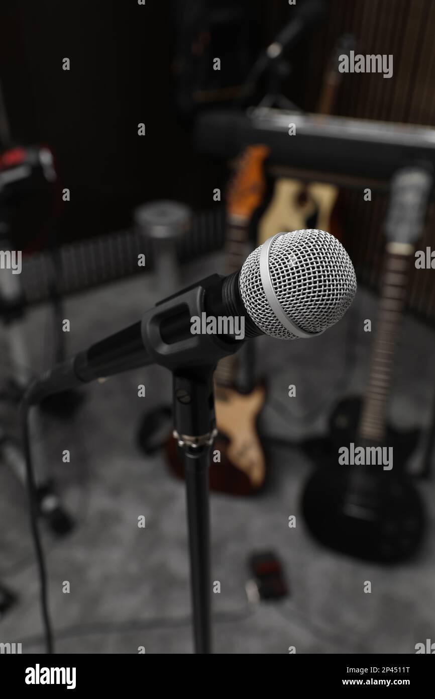 Modern microphone at recording studio. Music band practice Stock Photo