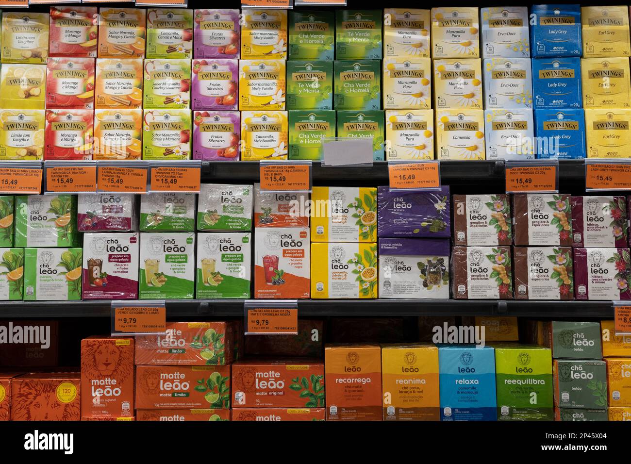 Petropolis, RJ, Brazil. 19 December 2023. Supermarket store shelf with various brands of tea bags, with price tags underneath of them Stock Photo