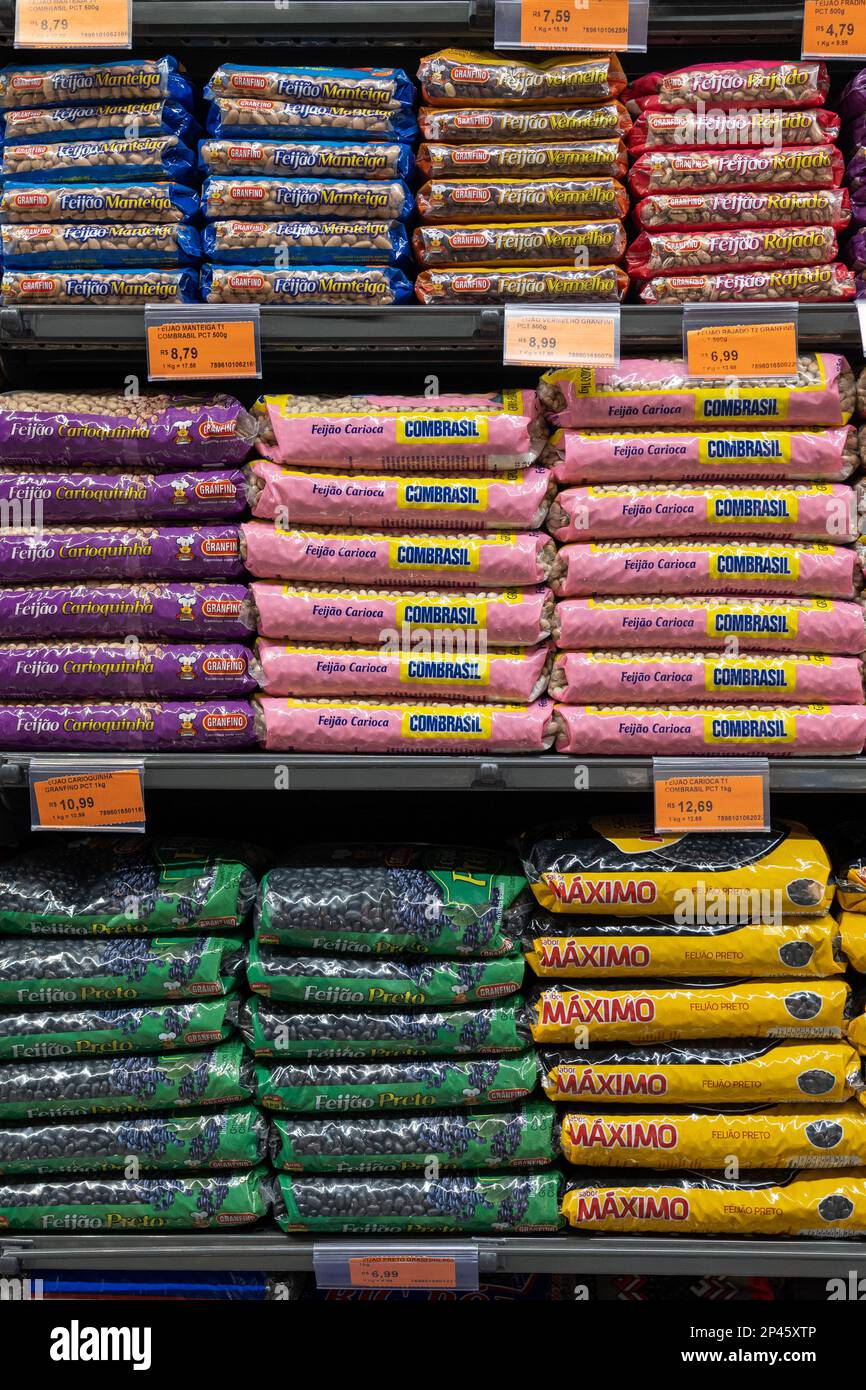 Petropolis, RJ, Brazil. 19 December 2023. Supermarket store shelf with various brands of beans, with price tags underneath of them Stock Photo