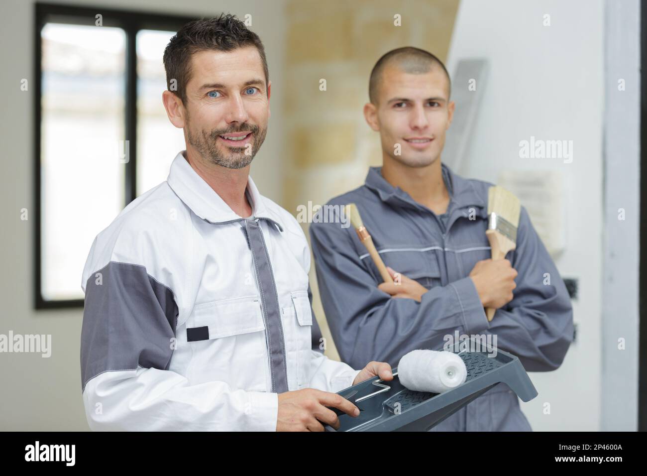 the painter with the apprentices Stock Photo