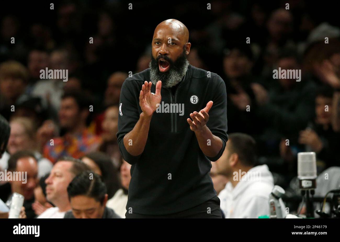 Brooklyn Nets head coach Jacque Vaughn calls a play during the first half of an NBA basketball