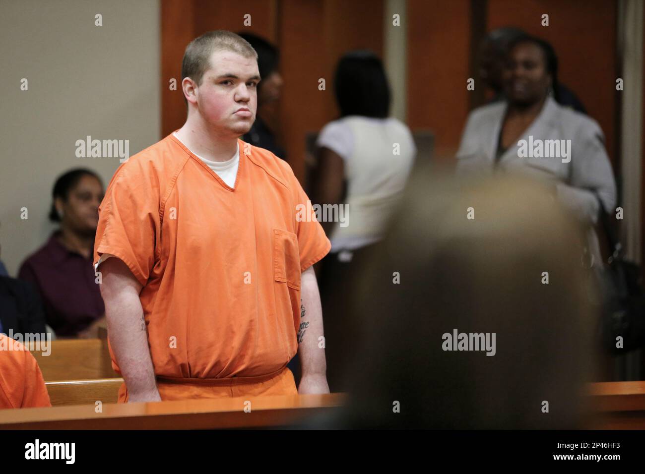 Michael Brandon Hill stands as his name is called during Tuesday's