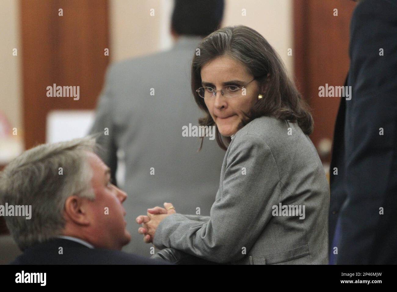 Dr. Ana Maria GonzalezAngulo sits in court with defense attorney Andy