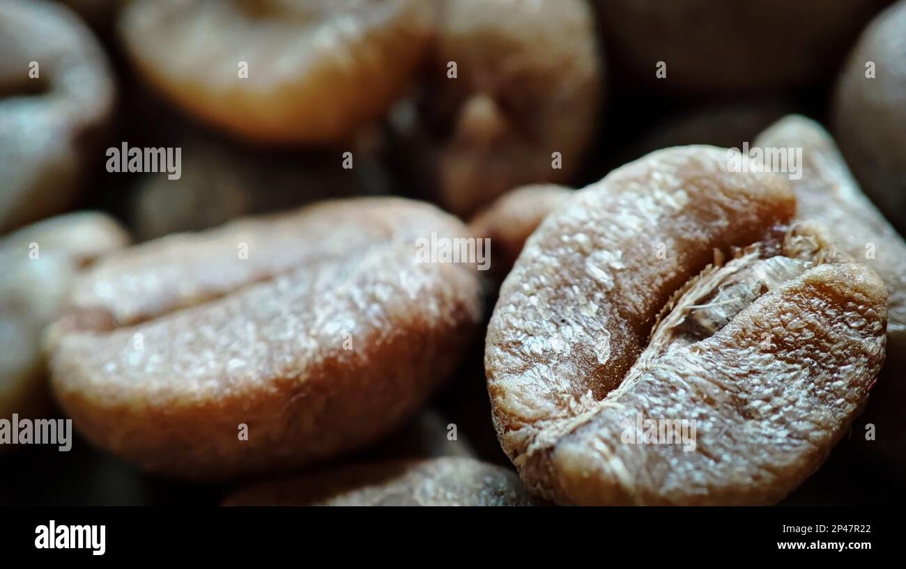 Macro shot coffee beans for background Stock Photo - Alamy