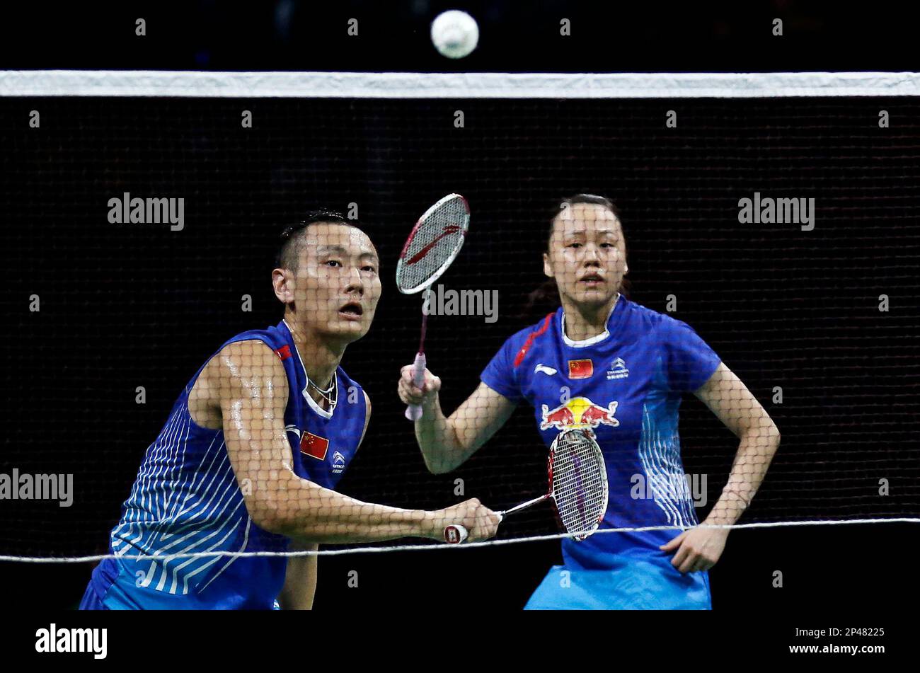China's Kinas Nan Zhang and Yunlei Zhao return to fellow countrymen Cheng  Liu og Yixin Bao during their semifinal-match at the World Badminton  Championships at Ballerup Arena, Denmark, Saturday, Aug. 30, 2014. (