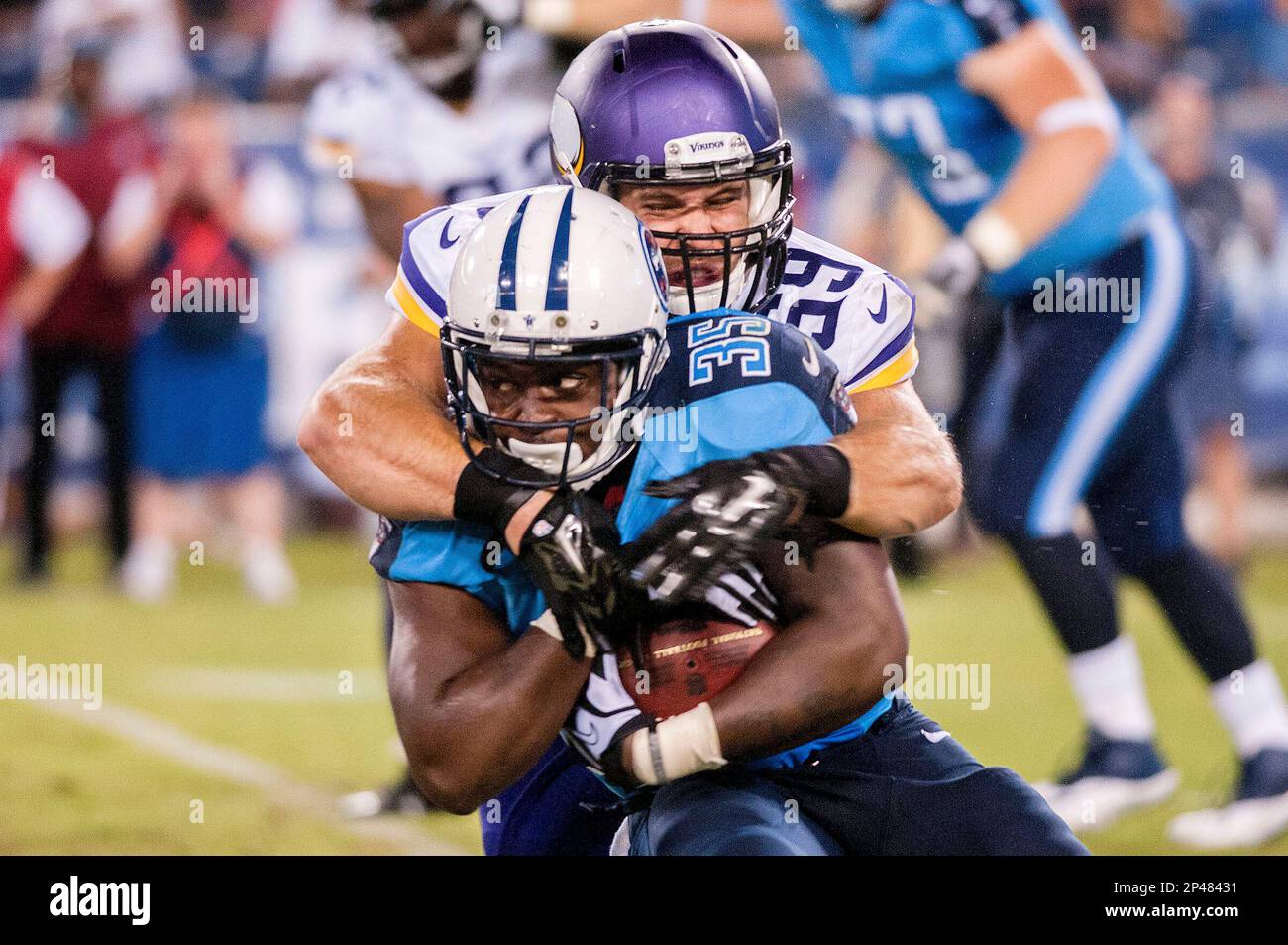 Tennessee Titans running back Antonio Andrews (26) goes 9 yards before New  Orleans Saints linebacker Michael Mauti (56) can bring make the tackle  during the third quarter at the Mercedes-Benz Superdome in