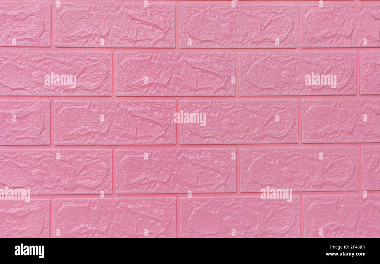 Pastel pink brick background wall texture Stock Photo